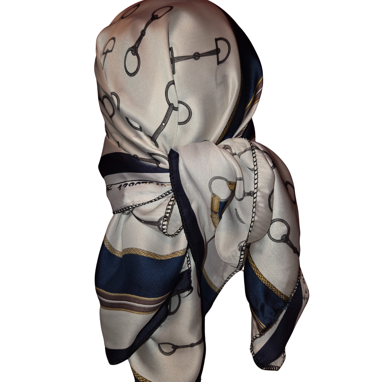 Silk scarf with horse-related design on a white background