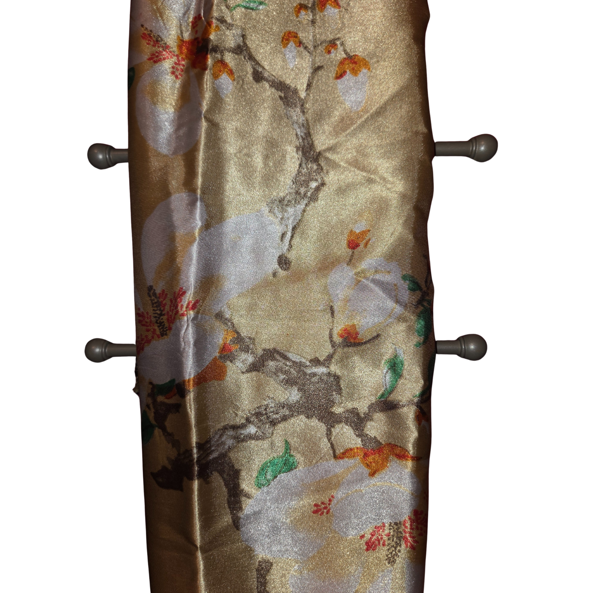 Decorative wall hook with floral pattern on a beige background