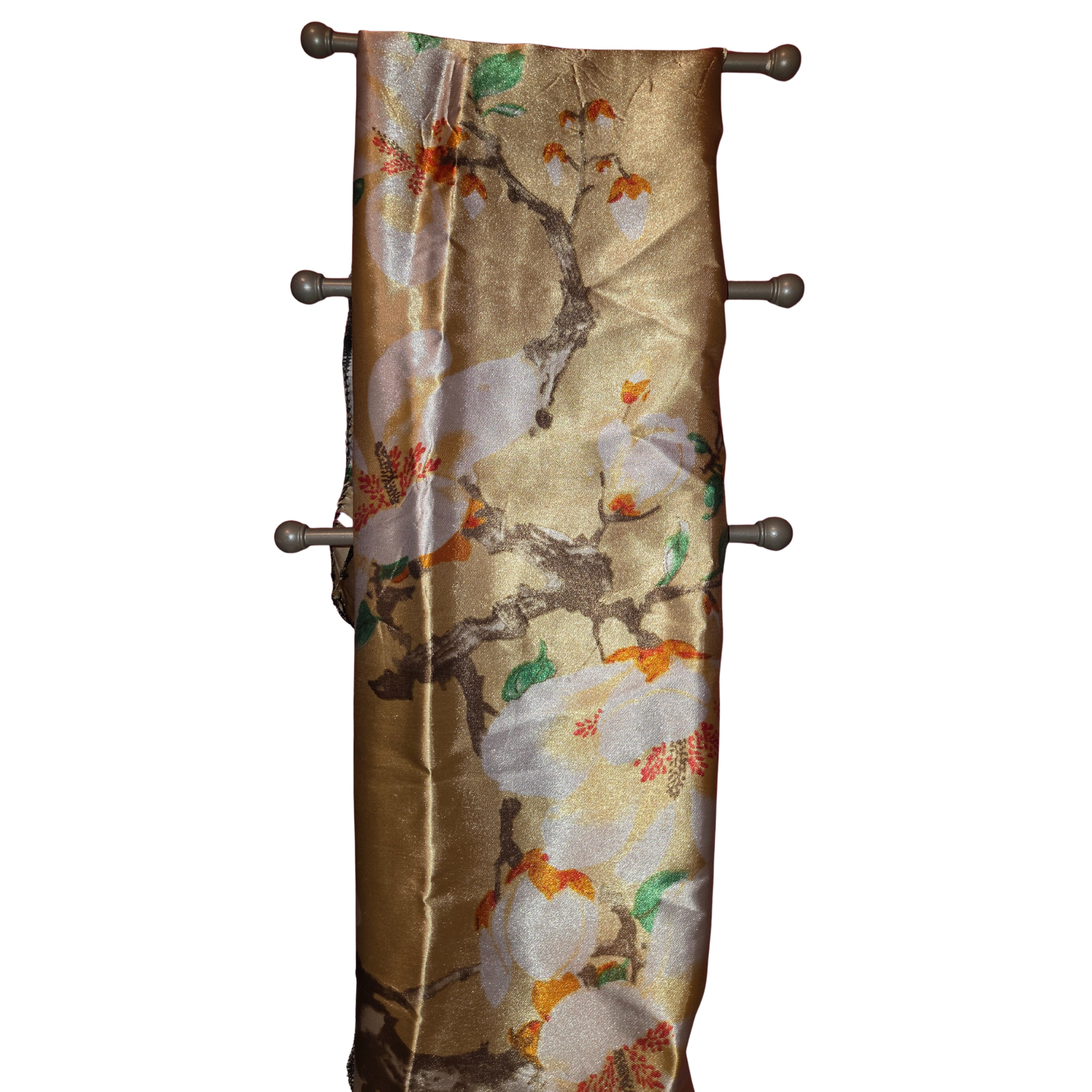Decorative wall hanging with floral pattern on a white background