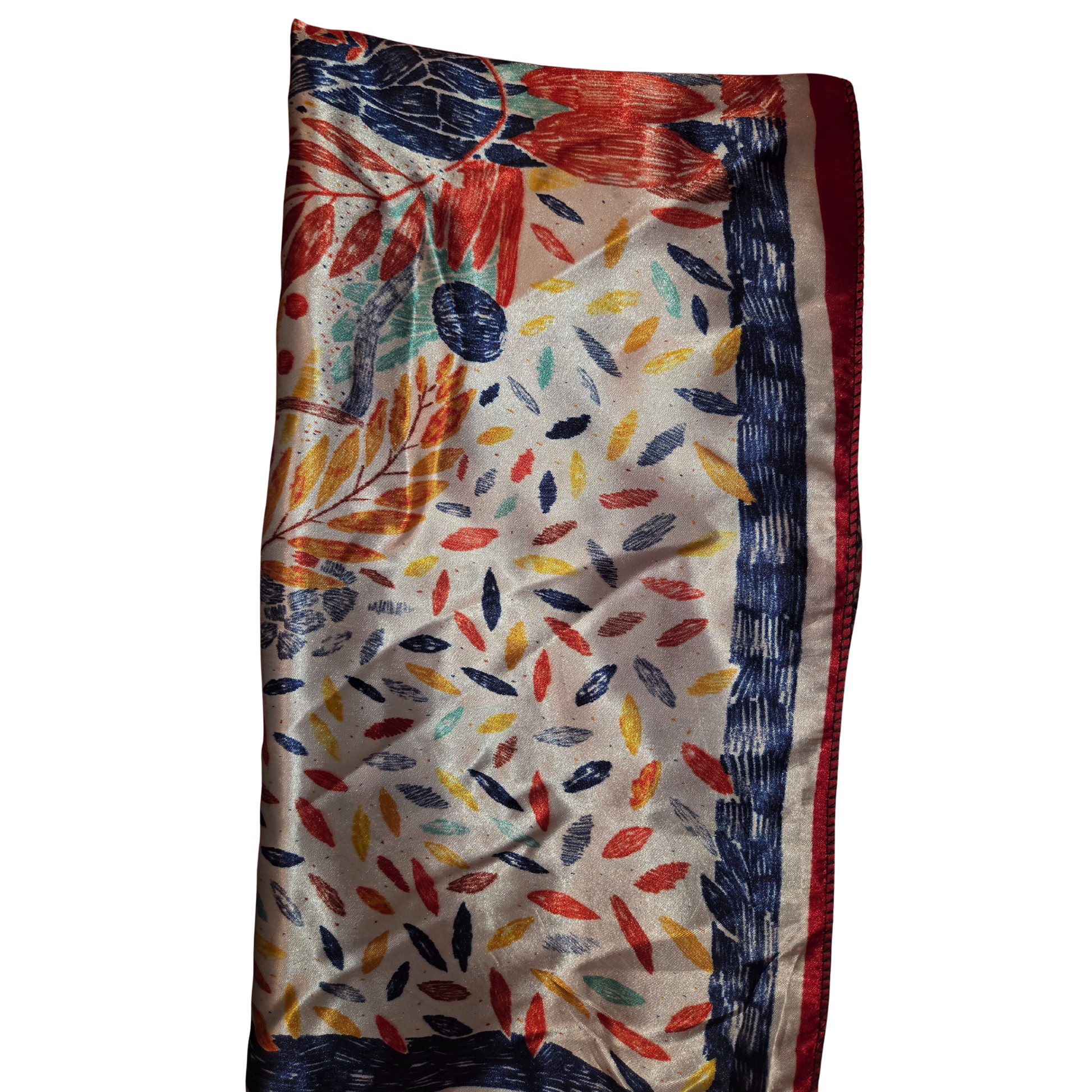 Colorful scarf with leaf pattern on a white background