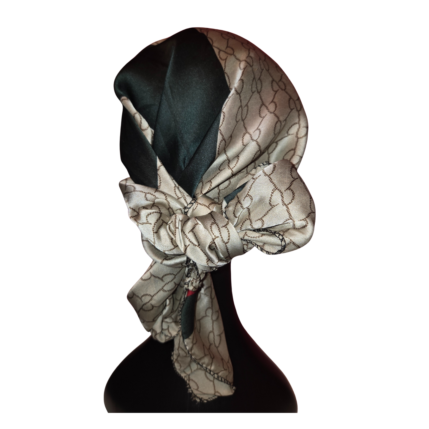 Patterned headscarf on a mannequin head against a white background
