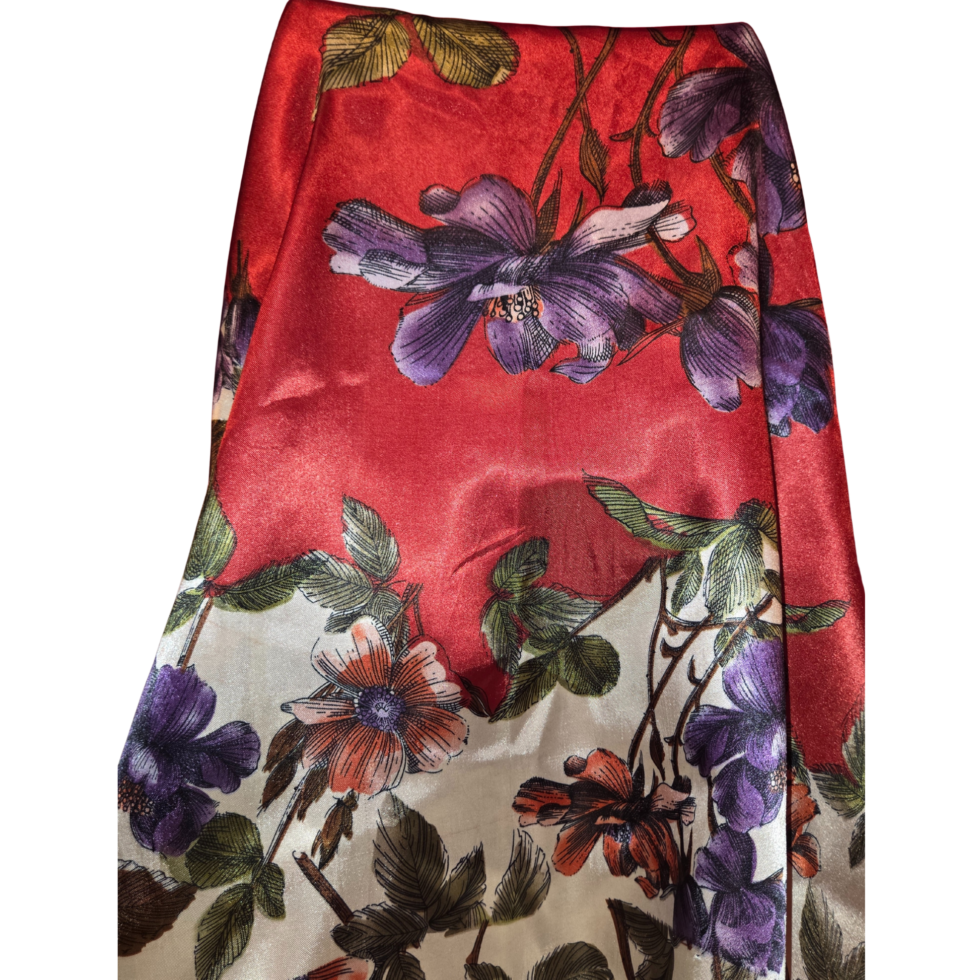 Floral patterned fabric with purple flowers on a red background