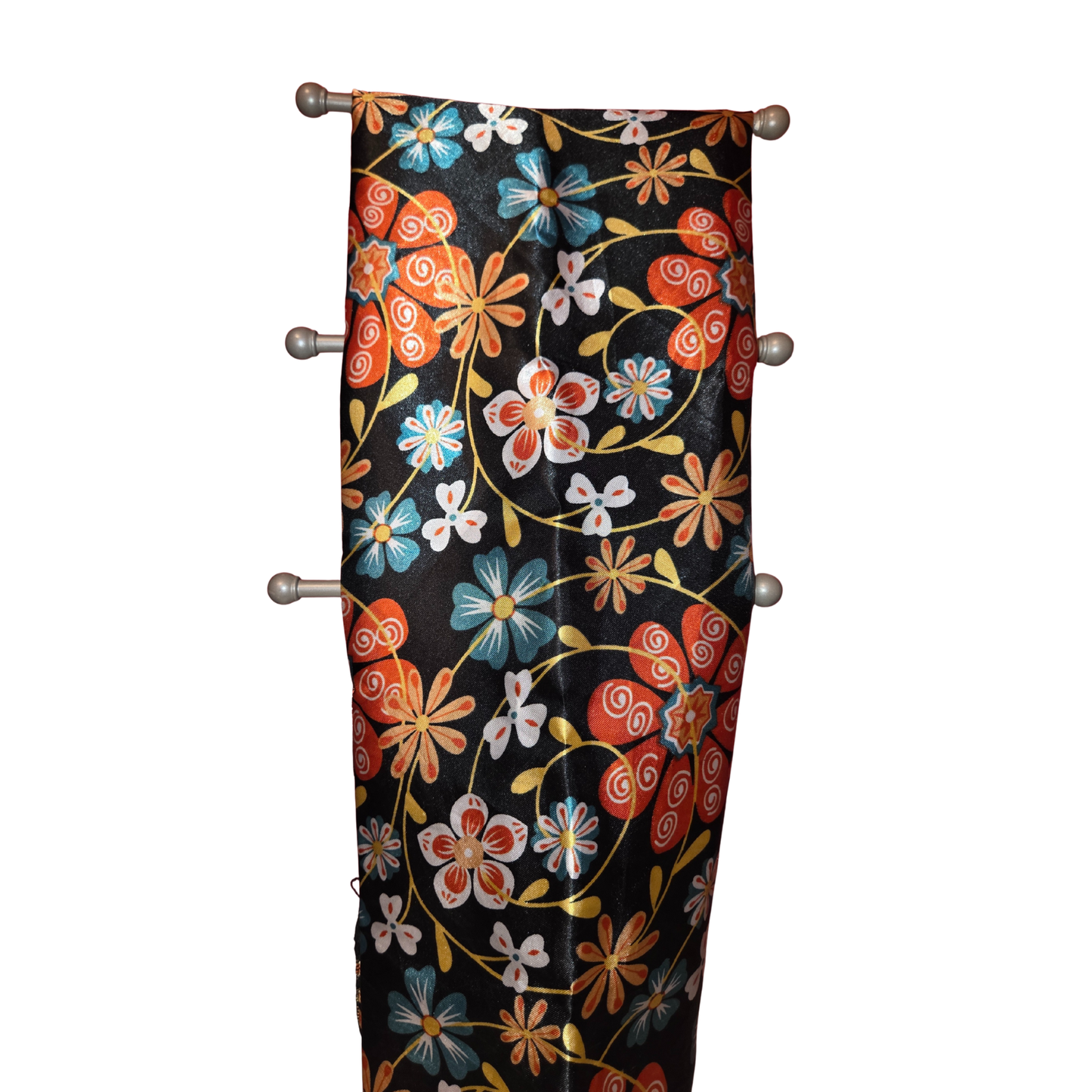 Decorative headboard with floral pattern on a black background