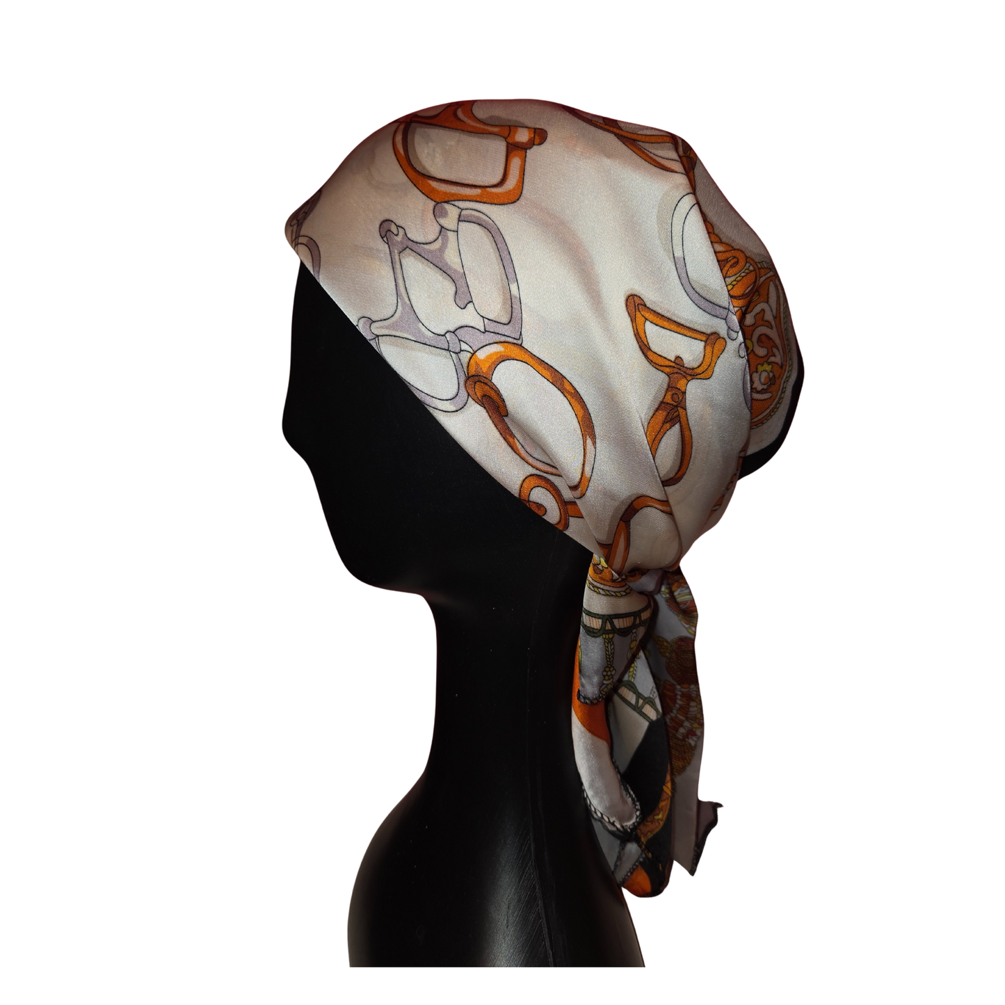 Silk scarf with a horse design on a mannequin head against a white background