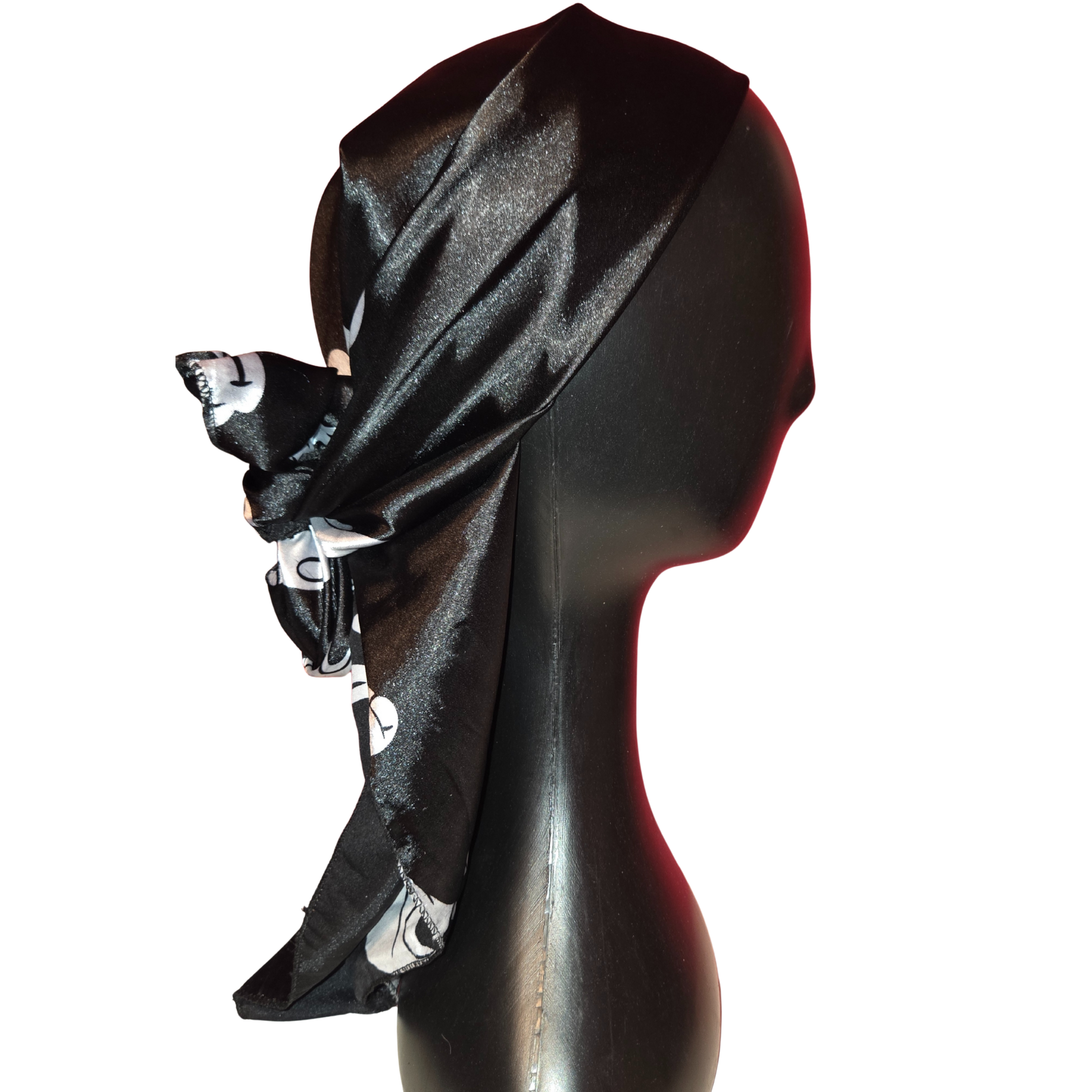 Black satin headscarf on a mannequin head with a white background