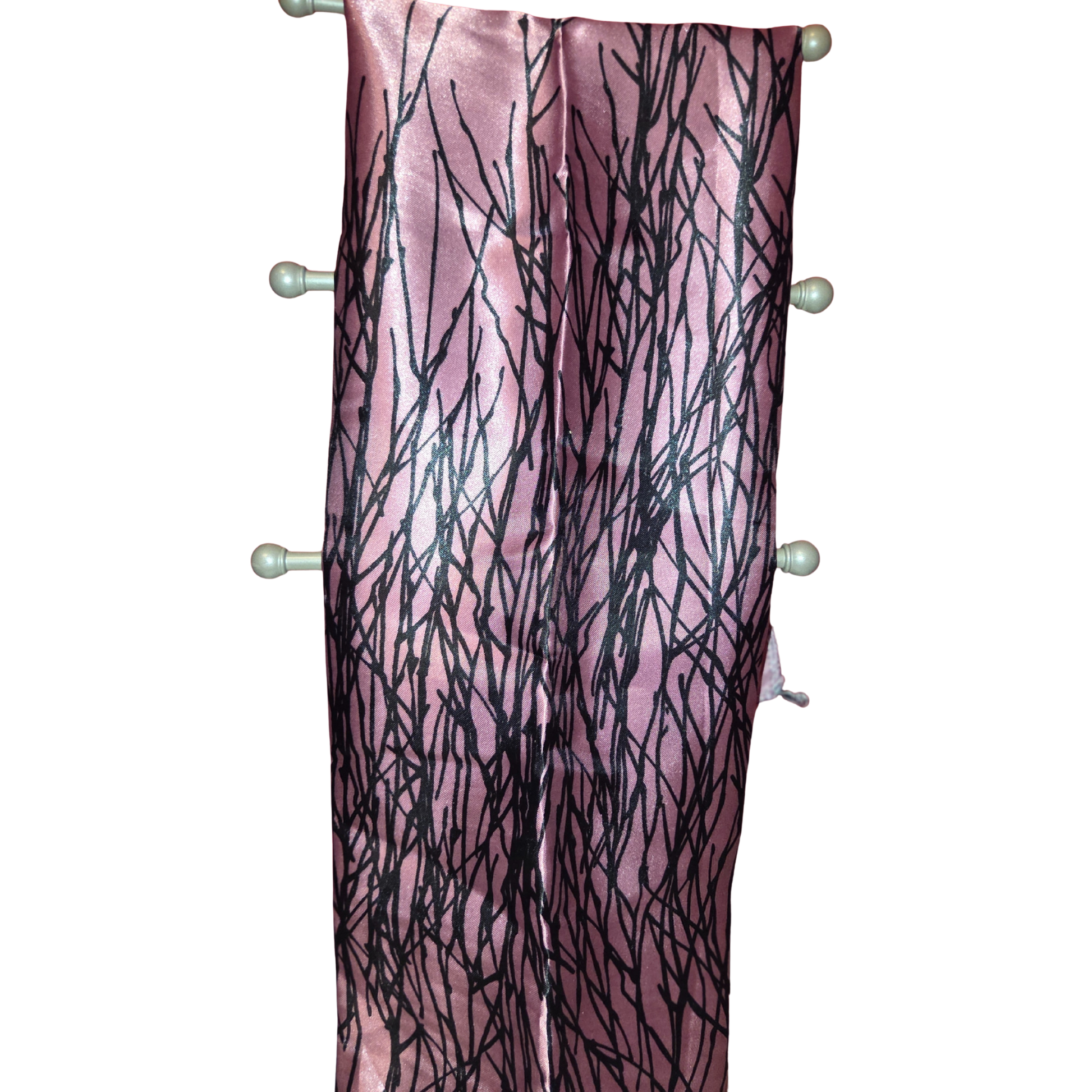 Pink scarf with black abstract pattern on a white background